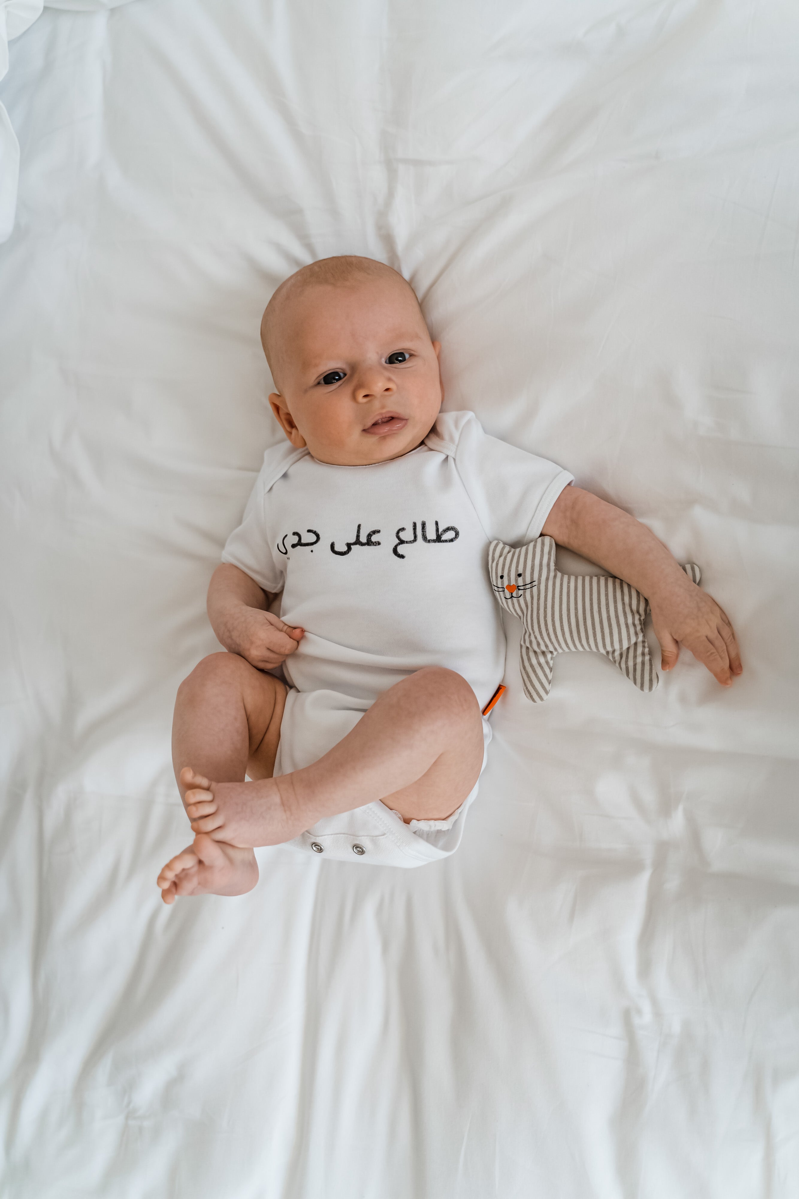 Organic onesie with Arabic text "I AM LIKE MY GRANDAD" for boys - Baby Elephant Organic Wear